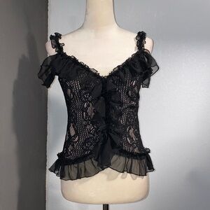 Black ruffle top. Semi new.
